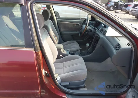 1999 Toyota Camry Le from USA, damaged, VIN 4T1BG22K7XU611639